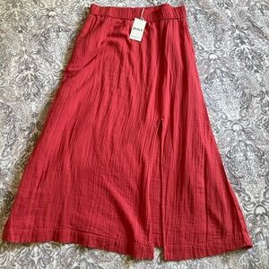 NWT Pact Red Skirt with slit size L